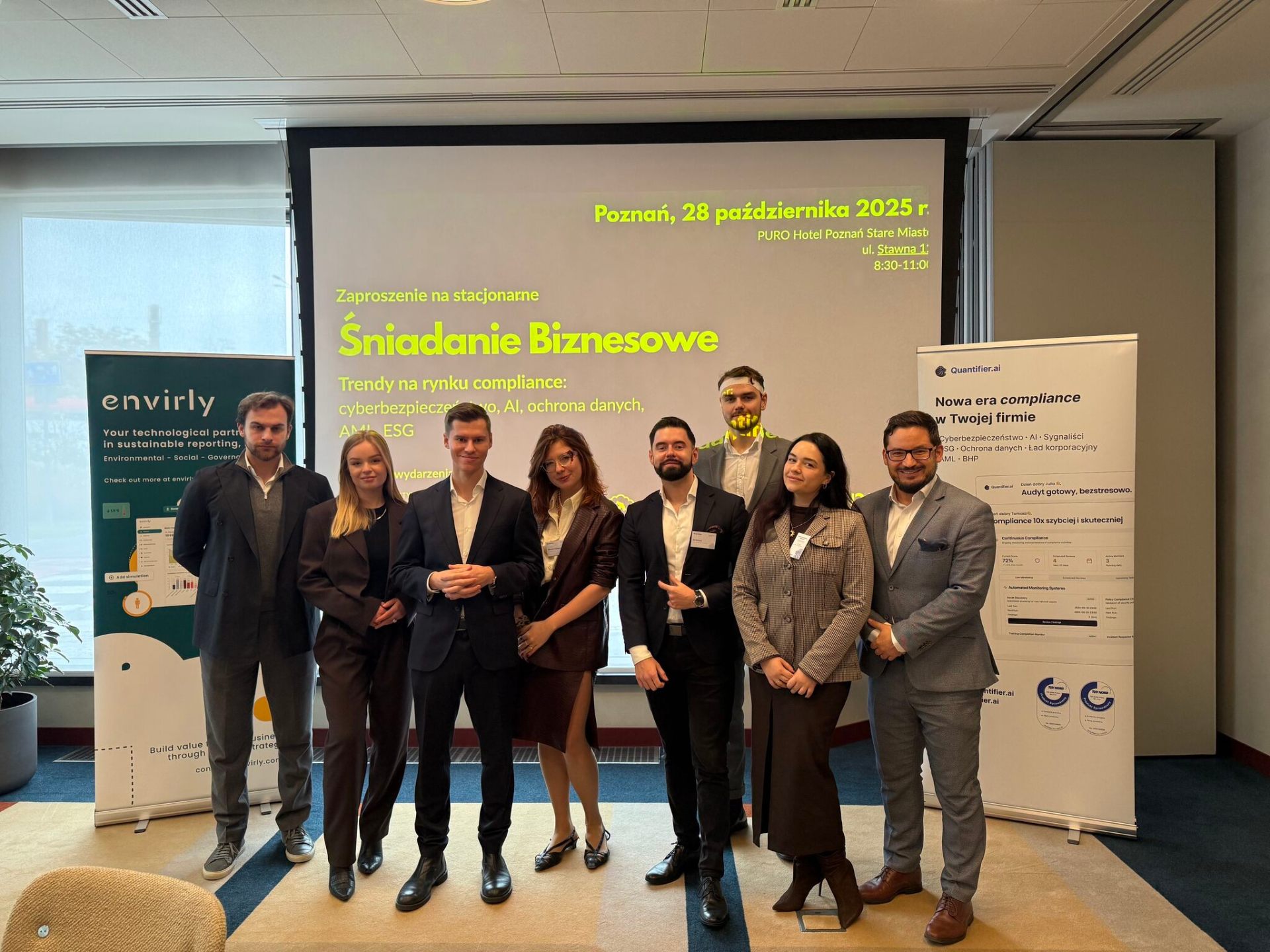 Quantifier.ai team at a conference